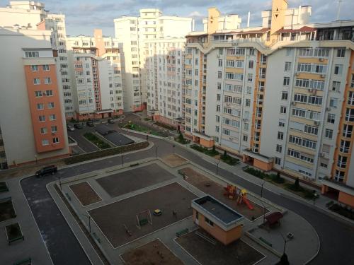 an aerial view of a city with tall buildings at modern home in Chişinău