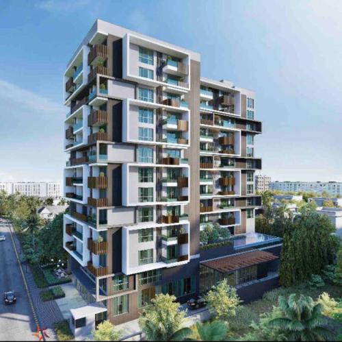 a tall building with balconies on the side of it at Solaris Premium Luxury Living in Accra