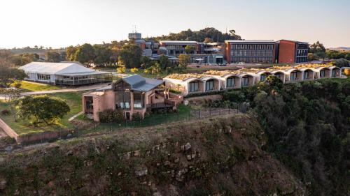 an aerial view of a campus with buildings at Angels View Hotel in Graskop