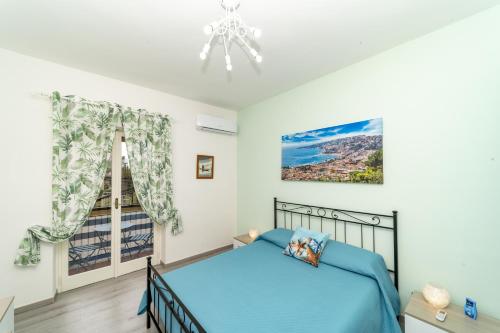 a bedroom with a bed and a window at John House in Sorrento