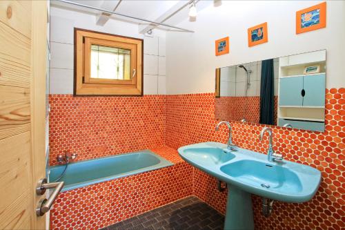 Ένα μπάνιο στο Chalet Les Carres