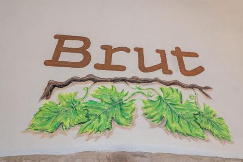 a sign with the word bilt on a wall at SMART San Martino in Paratico