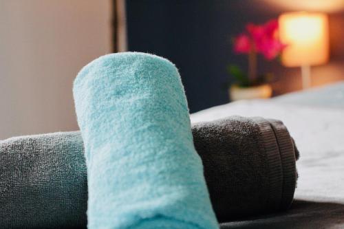 a person wearing a sock sitting on a couch at FeWoZauber - Domspatz, 50qm, Top-Lage, Style, Dachterrasse, Business in Schwerin