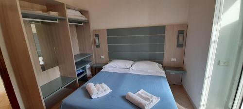 Katil atau katil-katil dalam bilik di Hotel Villa Argentina