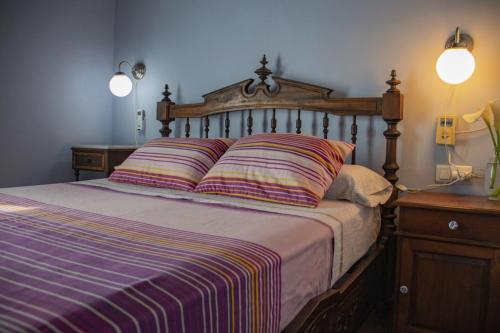 A bed or beds in a room at Torre Forcheron