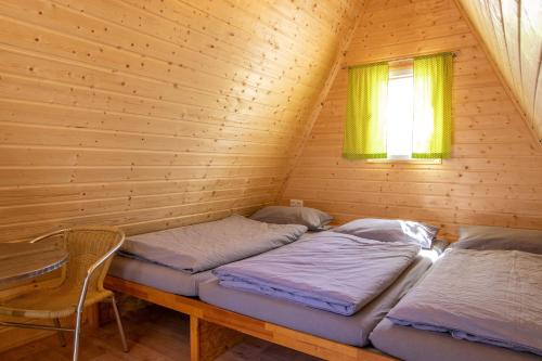 Postel nebo postele na pokoji v ubytování Ostseecamping Peenemündung
