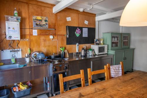 a kitchen with a sink and a counter top at Ostseecamping Peenemündung in Freest