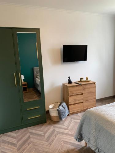 Lu Residence - Unique Apartmentsにあるテレビまたはエンターテインメントセンター