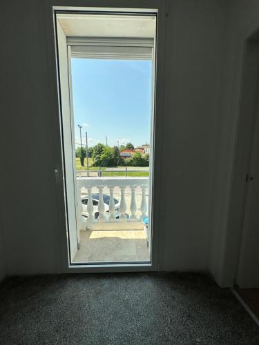 an open door with a view of a balcony at M14 RESIDENZA BASSANELLO in Padova