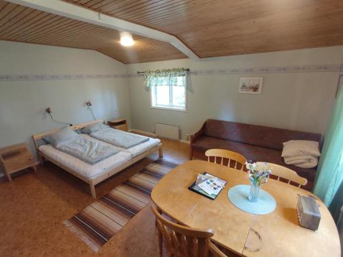 Postel nebo postele na pokoji v ubytování Selholmens Camping