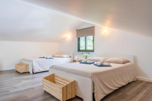 Postel nebo postele na pokoji v ubytování Encanto Village House