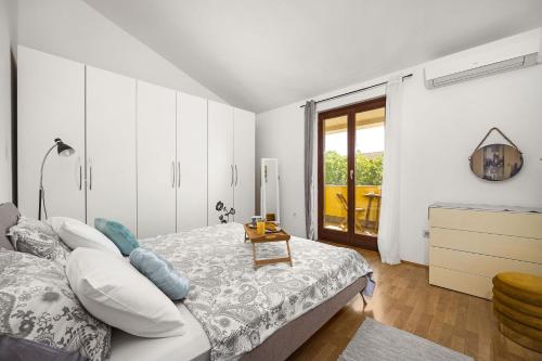 Katil atau katil-katil dalam bilik di Villa Lara