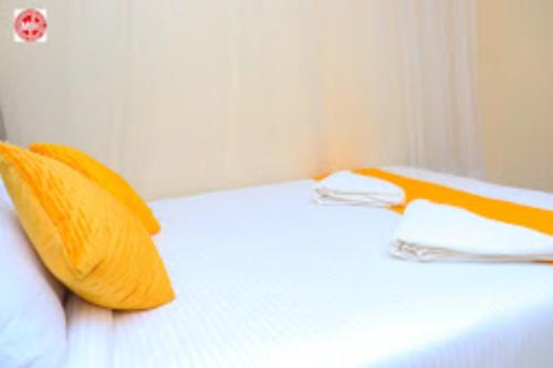 Postelja oz. postelje v sobi nastanitve Machakos Inn Hotel