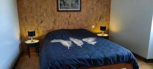 Postel nebo postele na pokoji v ubytování demeure de charme