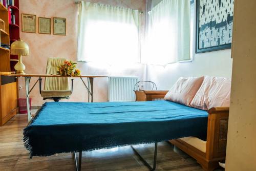 Кровать или кровати в номере Sunny Apartment