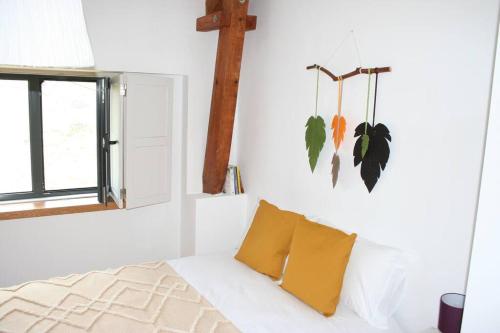 Un pat sau paturi într-o cameră la Quinta do Enxertado