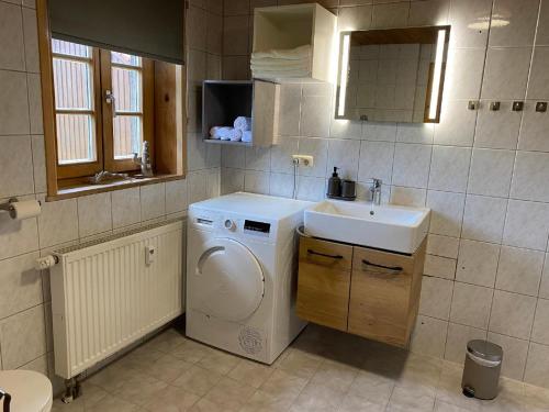 Kylpyhuone majoituspaikassa Ferienhaus De Lux