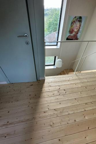 a room with a door and a window at La casa di Zoe-ARTANDTRAVEL in Montefiascone