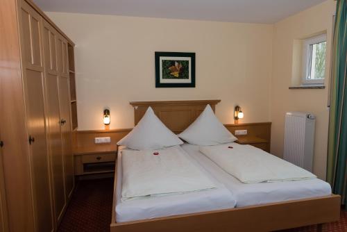 Ένα ή περισσότερα κρεβάτια σε δωμάτιο στο Appartementhaus Steiger