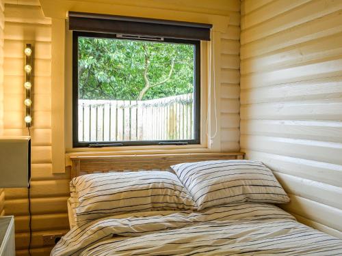 Llit o llits en una habitació de Rockhall - Souter Johnnies Cabin