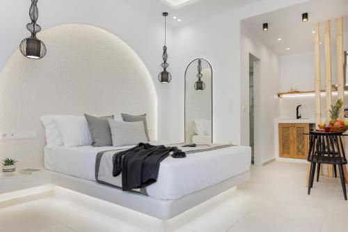Voodi või voodid majutusasutuse Naxos Alegria Luxury Apartment toas