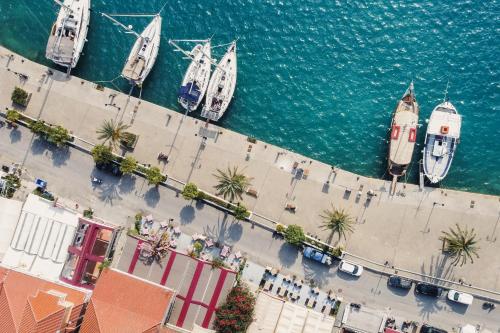 an overhead view of boats docked in a harbor at Mella Roa - Teal studio in Nydri