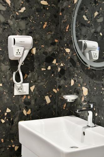 Koupelna v ubytování Elite Hotel
