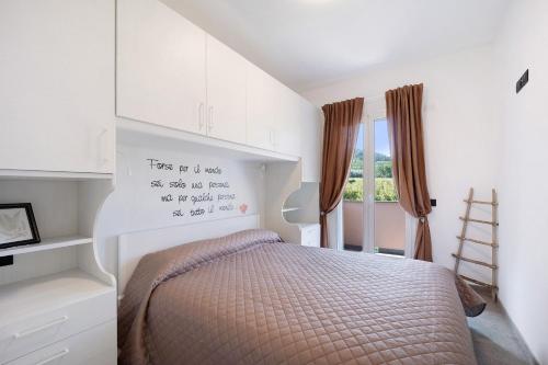 Postel nebo postele na pokoji v ubytování Antichi Ricordi - Il Fienile