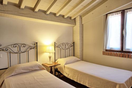 Llit o llits en una habitació de Cuccardino by PosarelliVillas