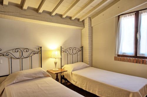 A bed or beds in a room at Cuccardino by PosarelliVillas