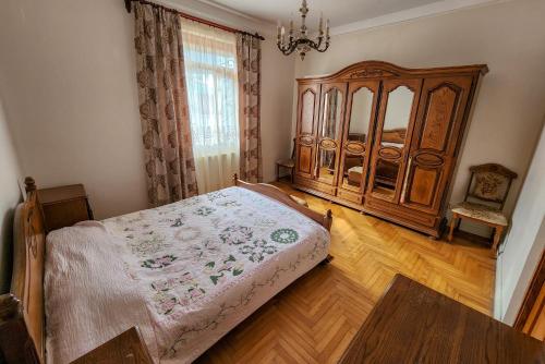 Postel nebo postele na pokoji v ubytování Kvariati Residence