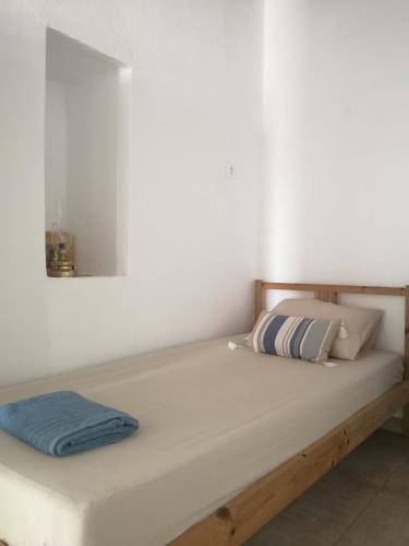 Katil atau katil-katil dalam bilik di Asimina's beach house