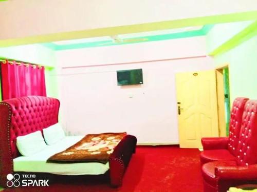 En eller flere senge i et værelse på Kashmir premium hotel
