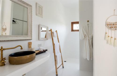 a bathroom with a wooden sink and a mirror at lory‘s home in Bangkok