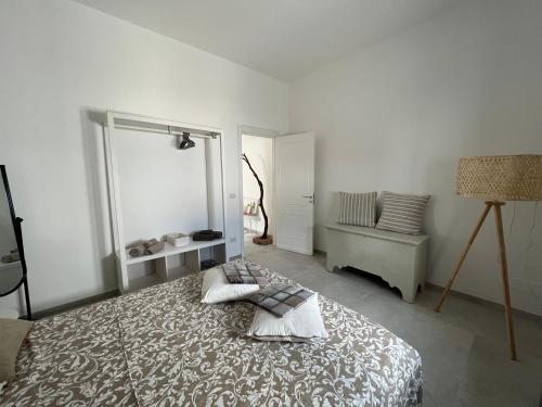 Ένα ή περισσότερα κρεβάτια σε δωμάτιο στο Casa Flavia