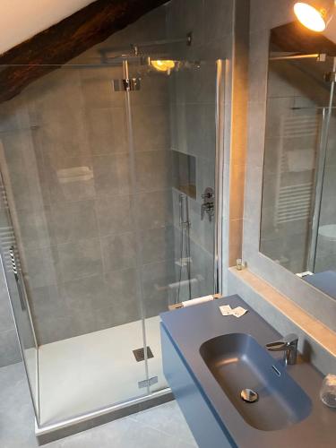 a bathroom with a shower and a sink at Artua'&Solferino in Turin