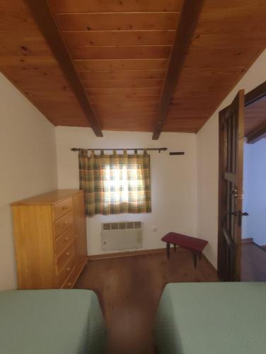 Ένα ή περισσότερα κρεβάτια σε δωμάτιο στο Casa Enry