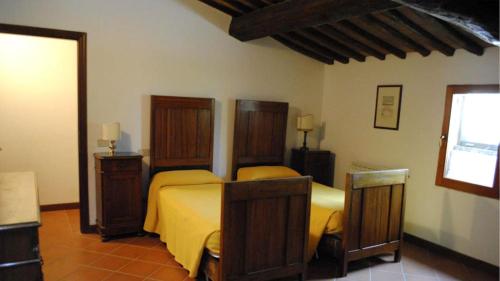 Cama o camas de una habitación en Il tinaio
