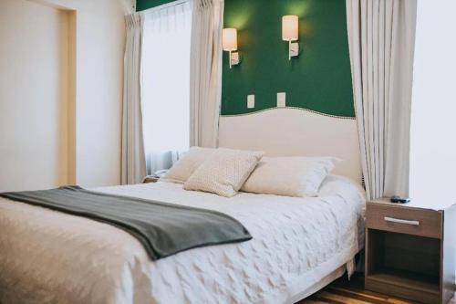 Postel nebo postele na pokoji v ubytování Anden Inca Hotel