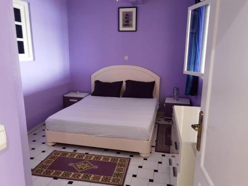 Кровать или кровати в номере Seaview Apartment Taghazout