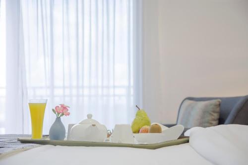 Una cama o camas en una habitación de Amaryllis Hotel Blantyre