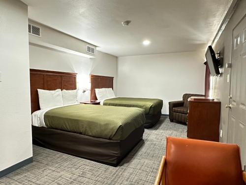 Postel nebo postele na pokoji v ubytování Llano Motel