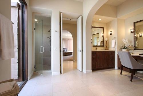 a bathroom with a shower and a sink and a mirror at Stunning Rancho Mirage Hilltop Compound in Rancho Mirage