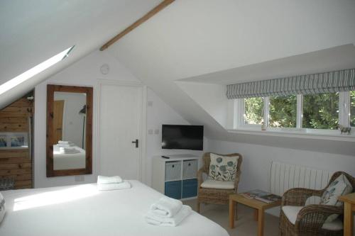 Ένα ή περισσότερα κρεβάτια σε δωμάτιο στο Cowslip Barn Annexe, Countryside Stay Near Chichester