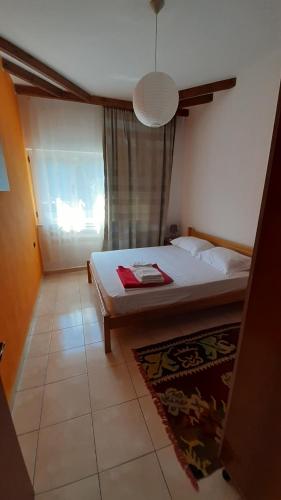 Una cama o camas en una habitación de Hotel Princi i Vogel