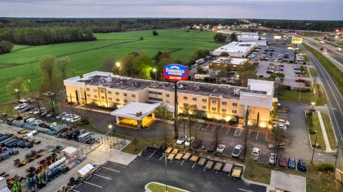 an overhead view of a parking lot with a gas station at Fairfield Inn by Marriott Lumberton in Lumberton