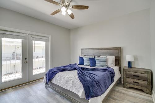 a bedroom with a bed and a ceiling fan at Pet-Friendly Vacation Rental in Biloxi Near Beach! in Biloxi
