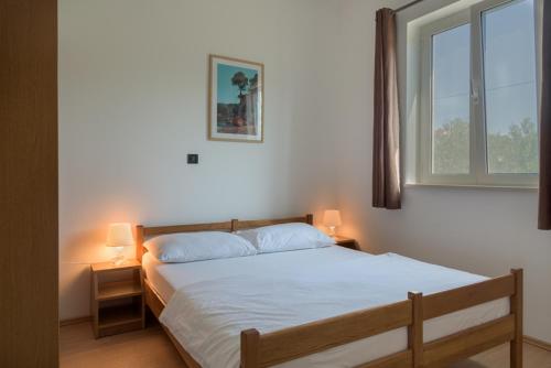 Fotografie z fotogalerie ubytování Rasin Apartments v Pakoštane