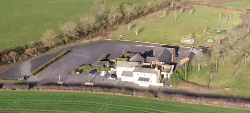 an aerial view of a large house in a field at Shepherds Gate at The Royal Oak Much Marcle in Preston