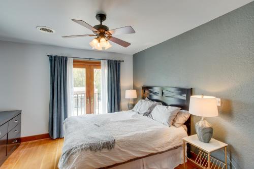 a bedroom with a bed and a ceiling fan at Elkhart Lake Vacation Rental 3 Mi to Road America! in Elkhart Lake